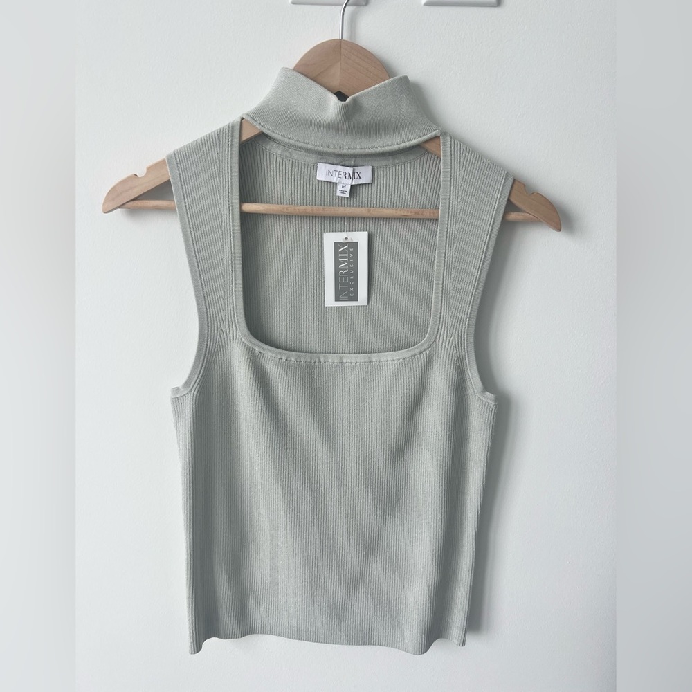 Intermix sleeveless, ribbed, mock neck, cut out top